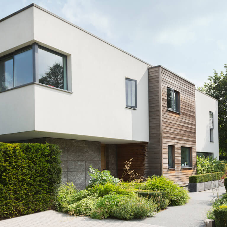 Immobilie im Hintergrund der Immobilienmakler aus Übach-Palenberg